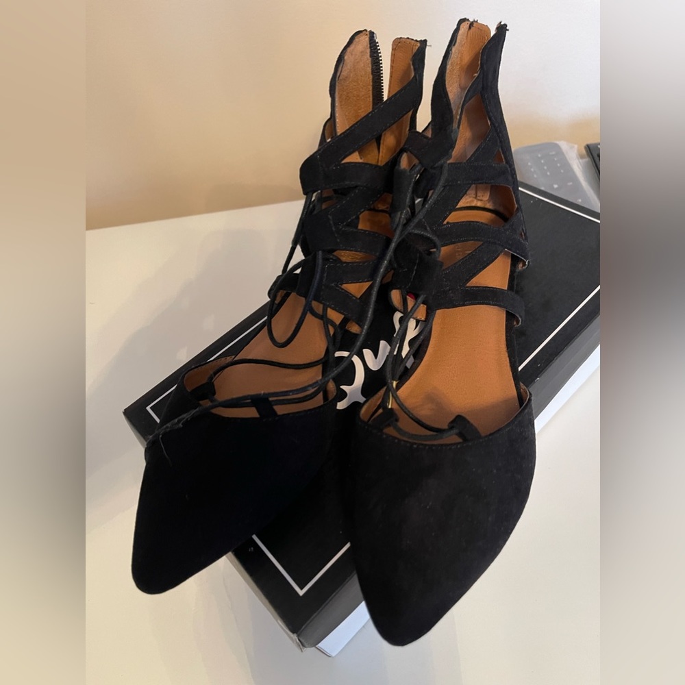 Black faux suede flats